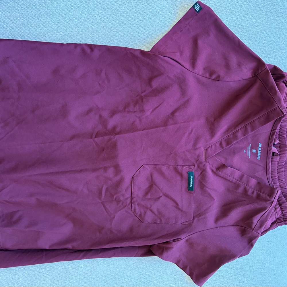 Jaanuu Women's Top in Burgundy- ATHLETIC material